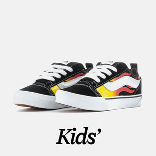 Black sneakers with colorful flame design on a white background, labeled 'Kids'.