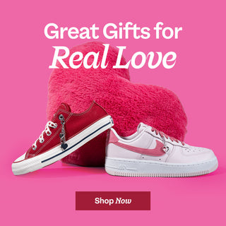 Two pairs of shoes with a heart-shaped pillow and text on a pink background